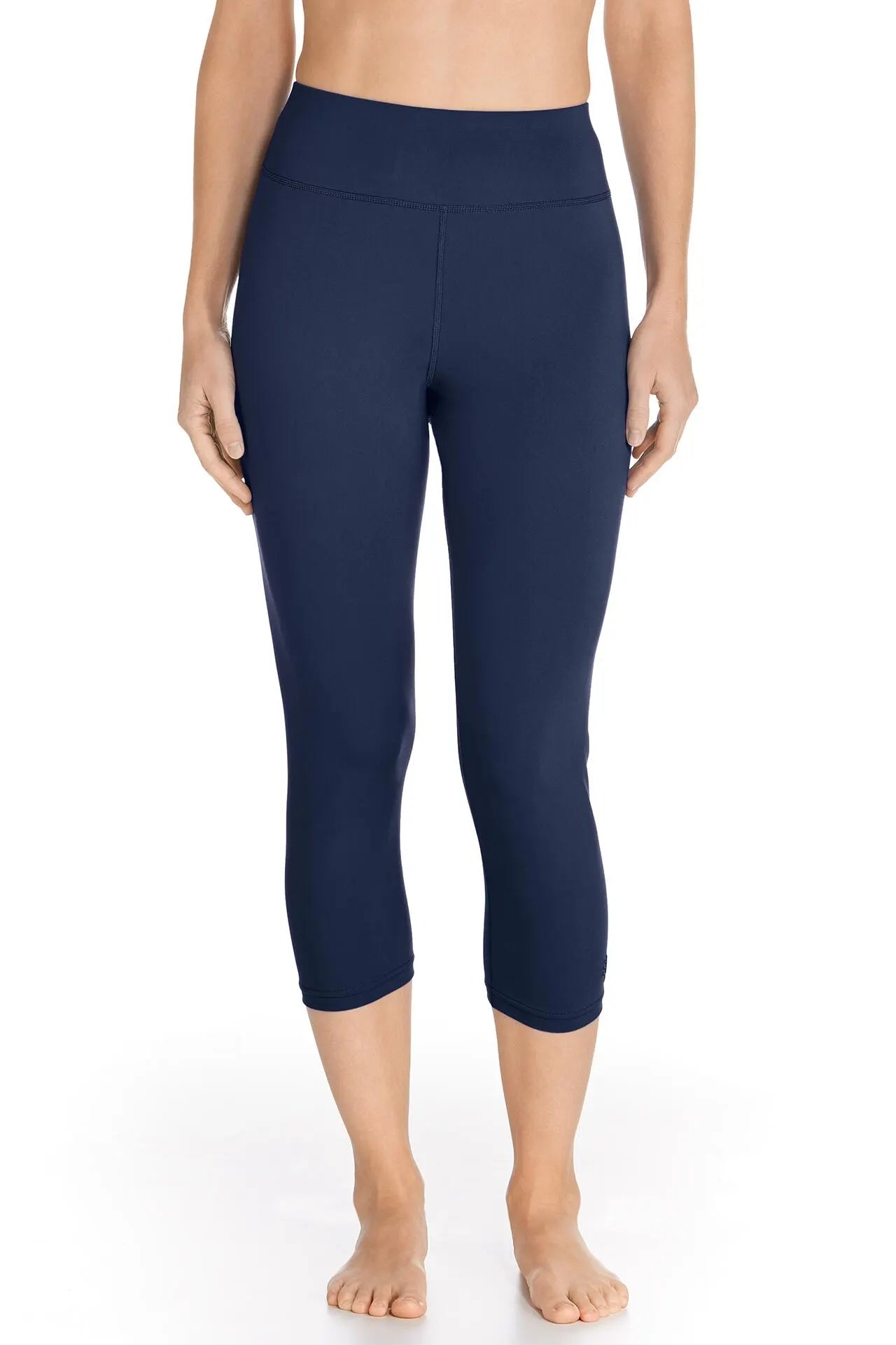 Front image of Coolibar deep water swim capri. Navy pull on capri bottom.
