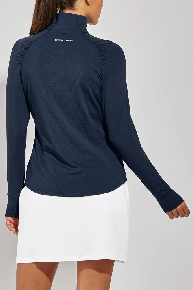 Back image of Coolibar arabella quarter zip pullover top. Navy long sleeve top. 