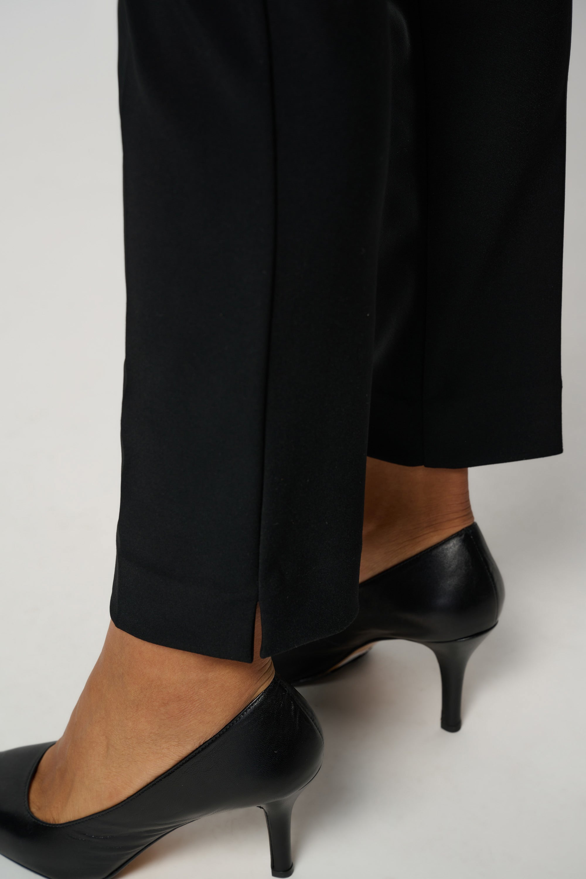 Front detail image of Joseph Ribkoff pull on classic tailored slim pant in black.