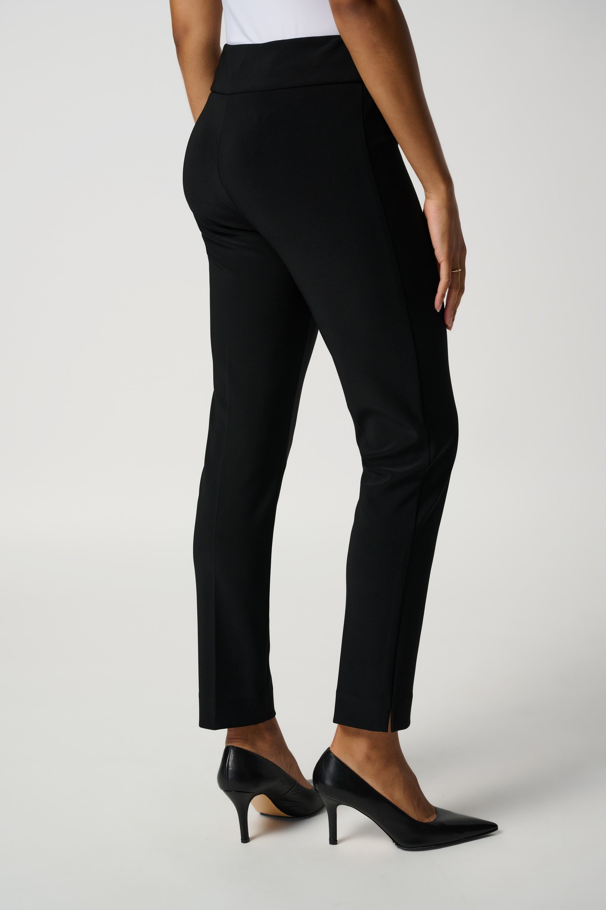 Side image of Joseph Ribkoff pull on classic tailored slim pant in black.