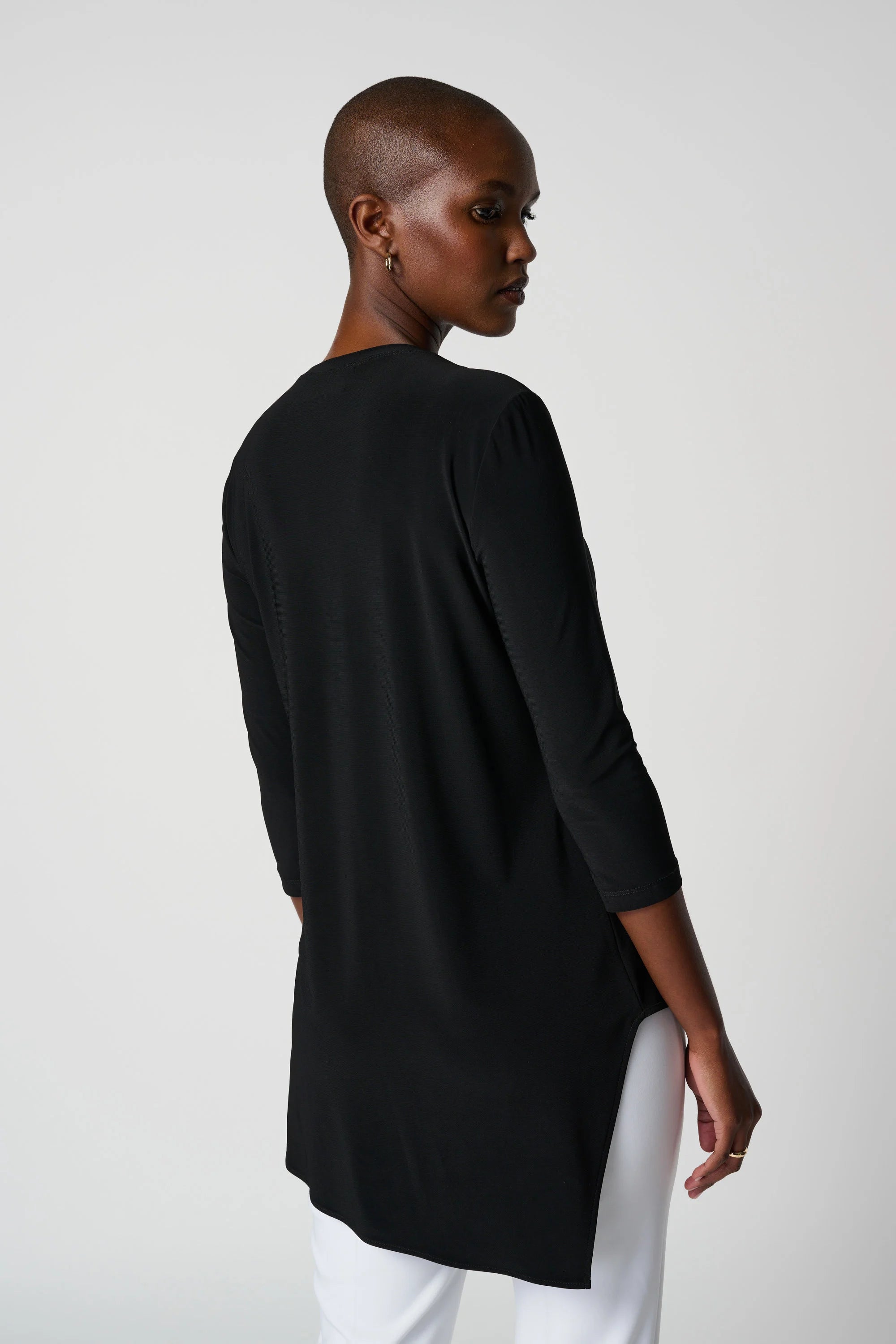 Back image of Joseph Ribkoff asymmetrical hem tunic in black.