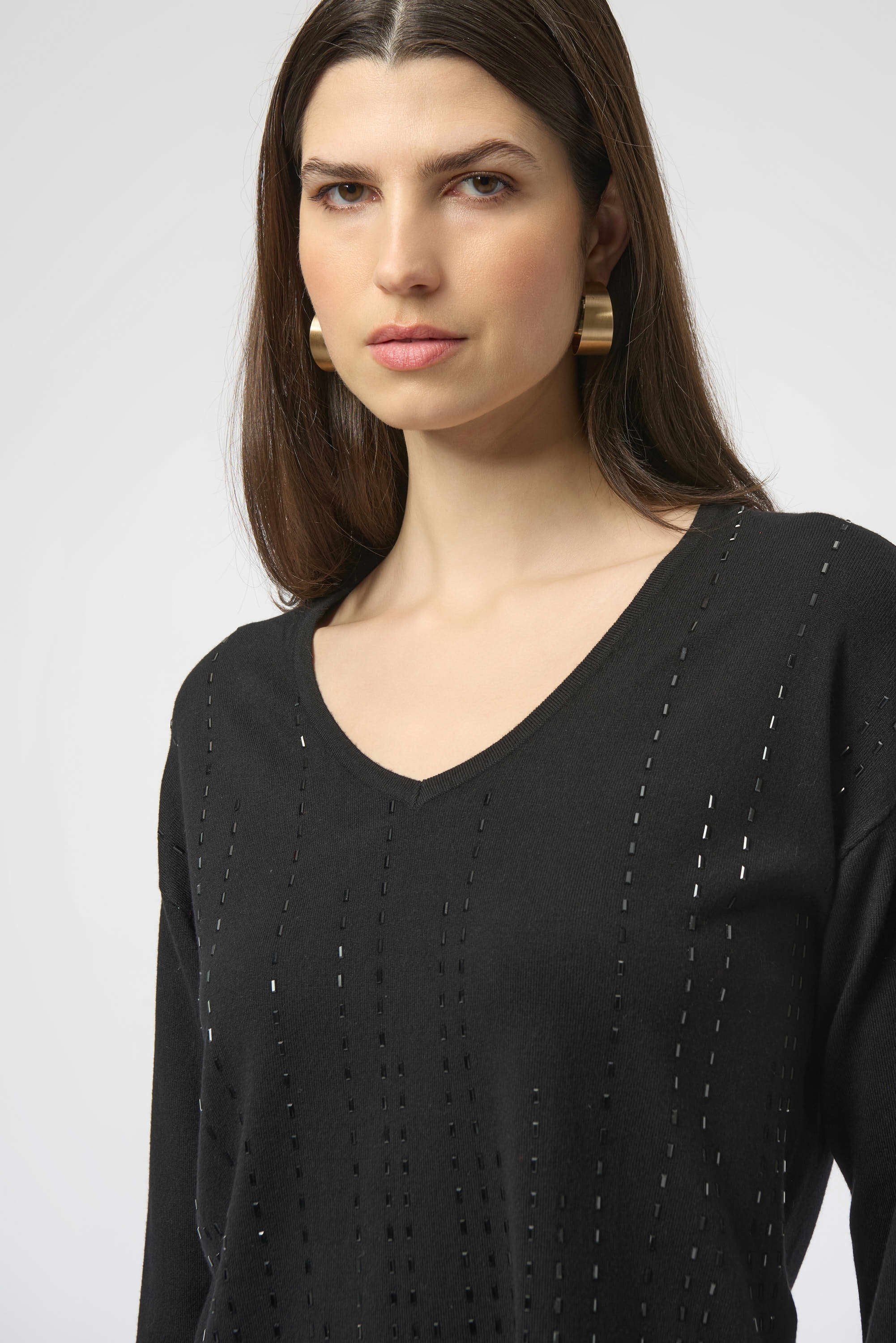Close up View Image of Joseph Ribkoff Sweater Knit Pullover with Iron-On Detail in Black