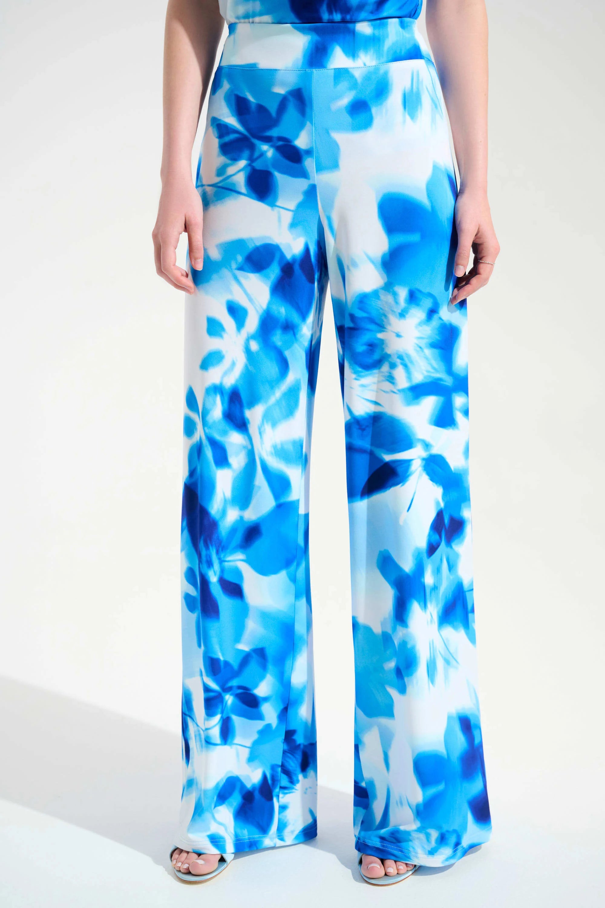 Front View Of Joseph Ribkoff Silky Knit Floral Print Wide Leg Pants in Vanilla/Blue