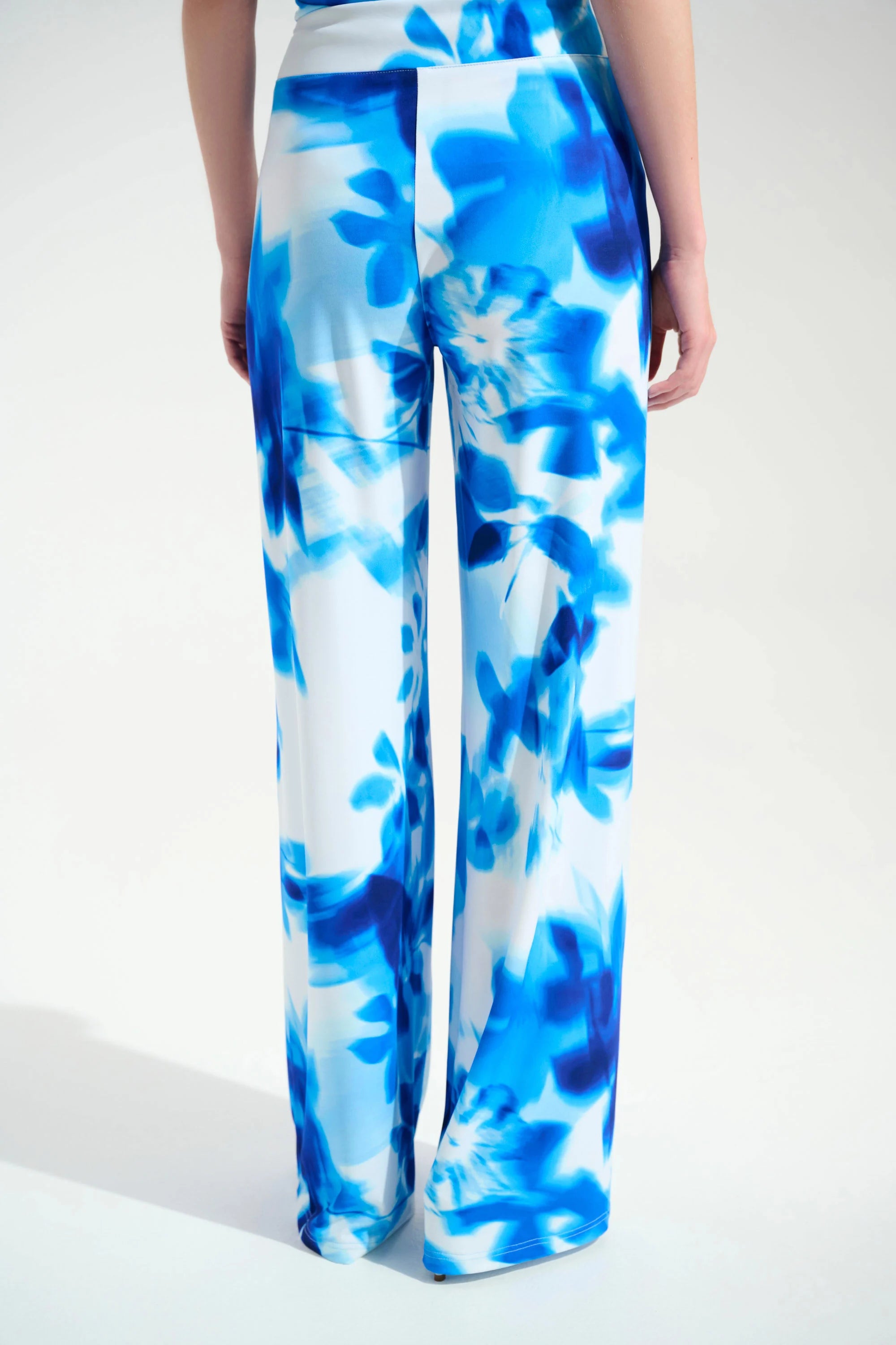 Back View Of Joseph Ribkoff Silky Knit Floral Print Wide Leg Pants in Vanilla/Blue