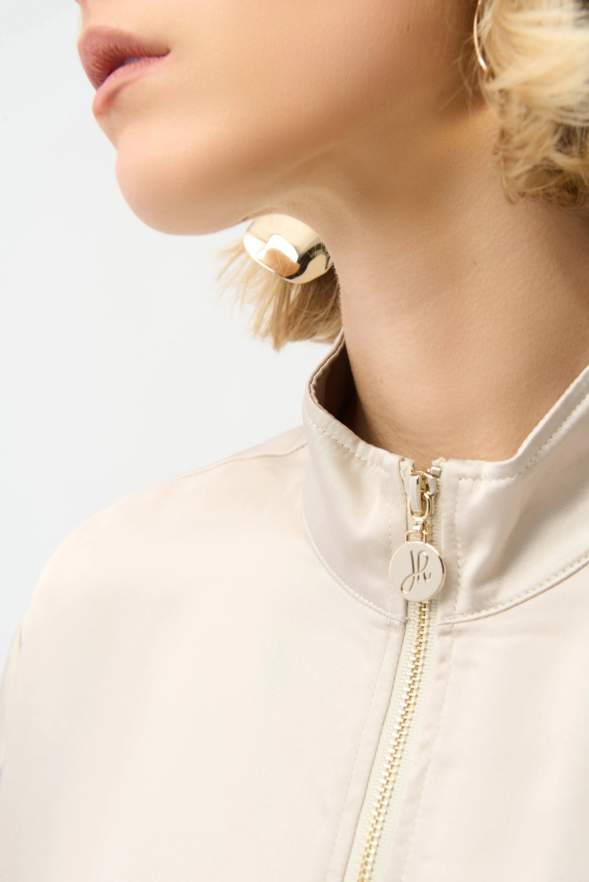 Close Up View Image of Joseph Ribkoff Satin Boxy Blouson Jacket With Drawstring Hem in Moonstone
