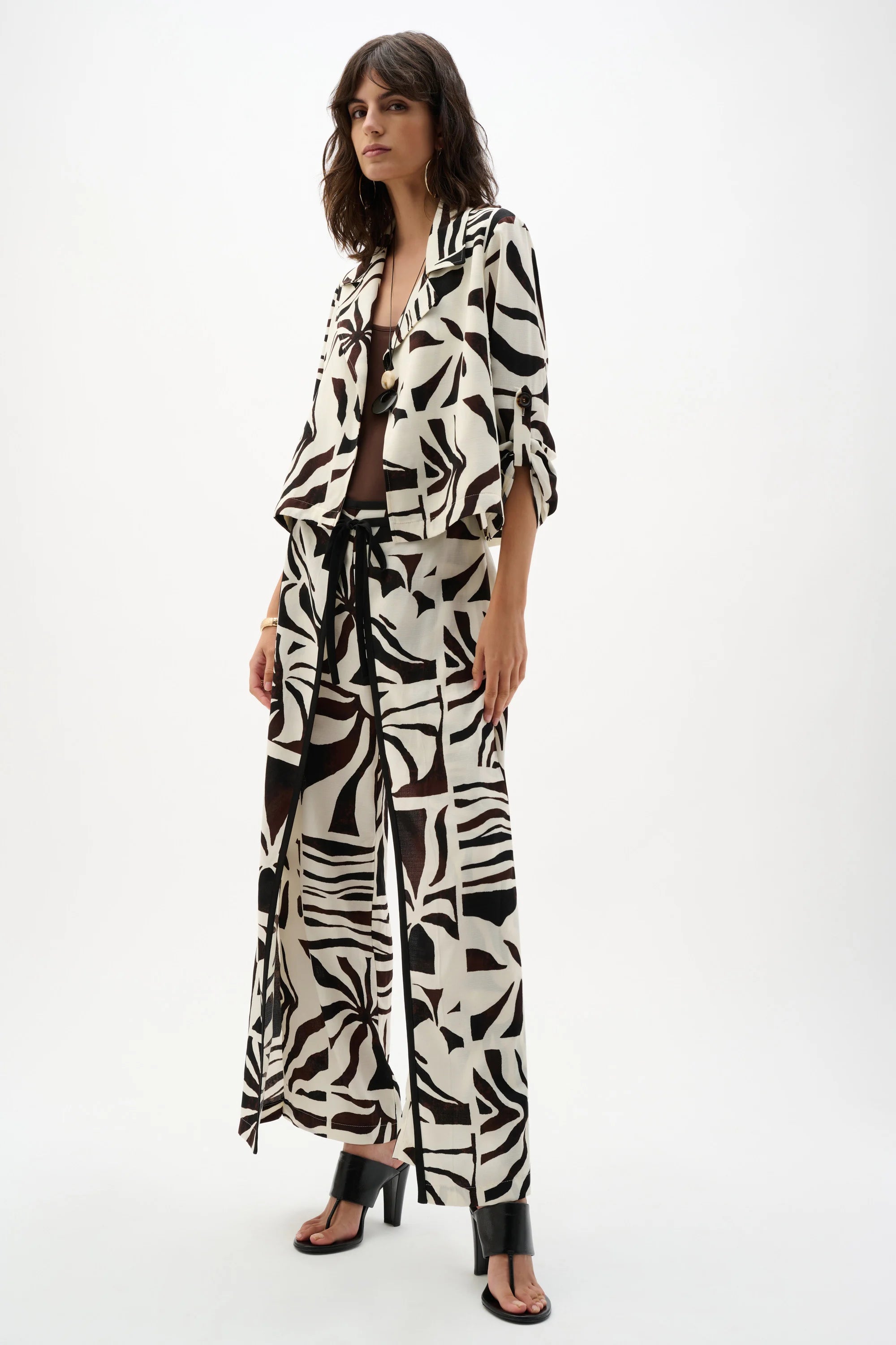 Full Body View Image of Joseph Ribkoff Woven Gauze Tropical Print Wide Leg Pants in Beige/Multi