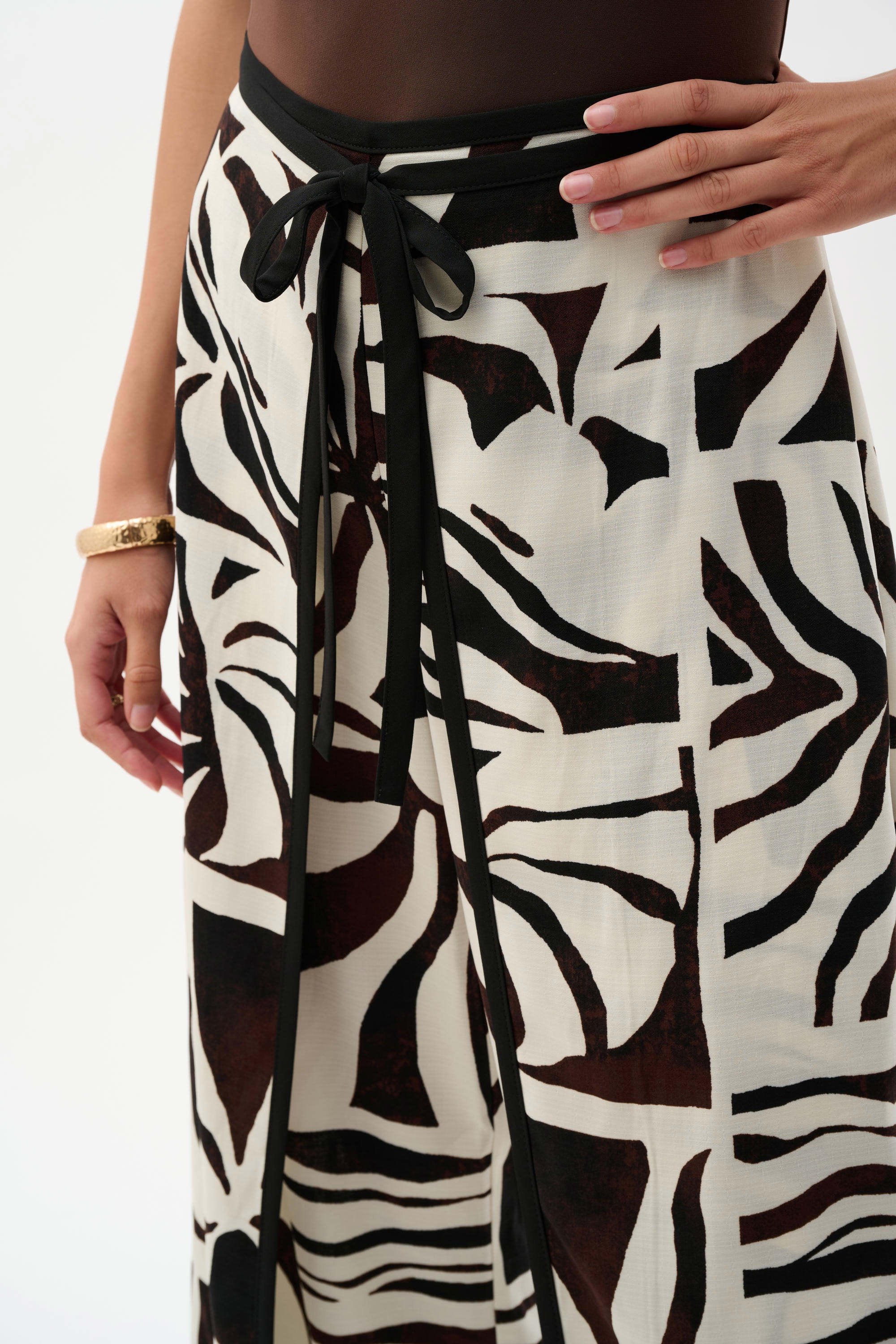 Close Up View Image of Joseph Ribkoff Woven Gauze Tropical Print Wide Leg Pants in Beige/Multi