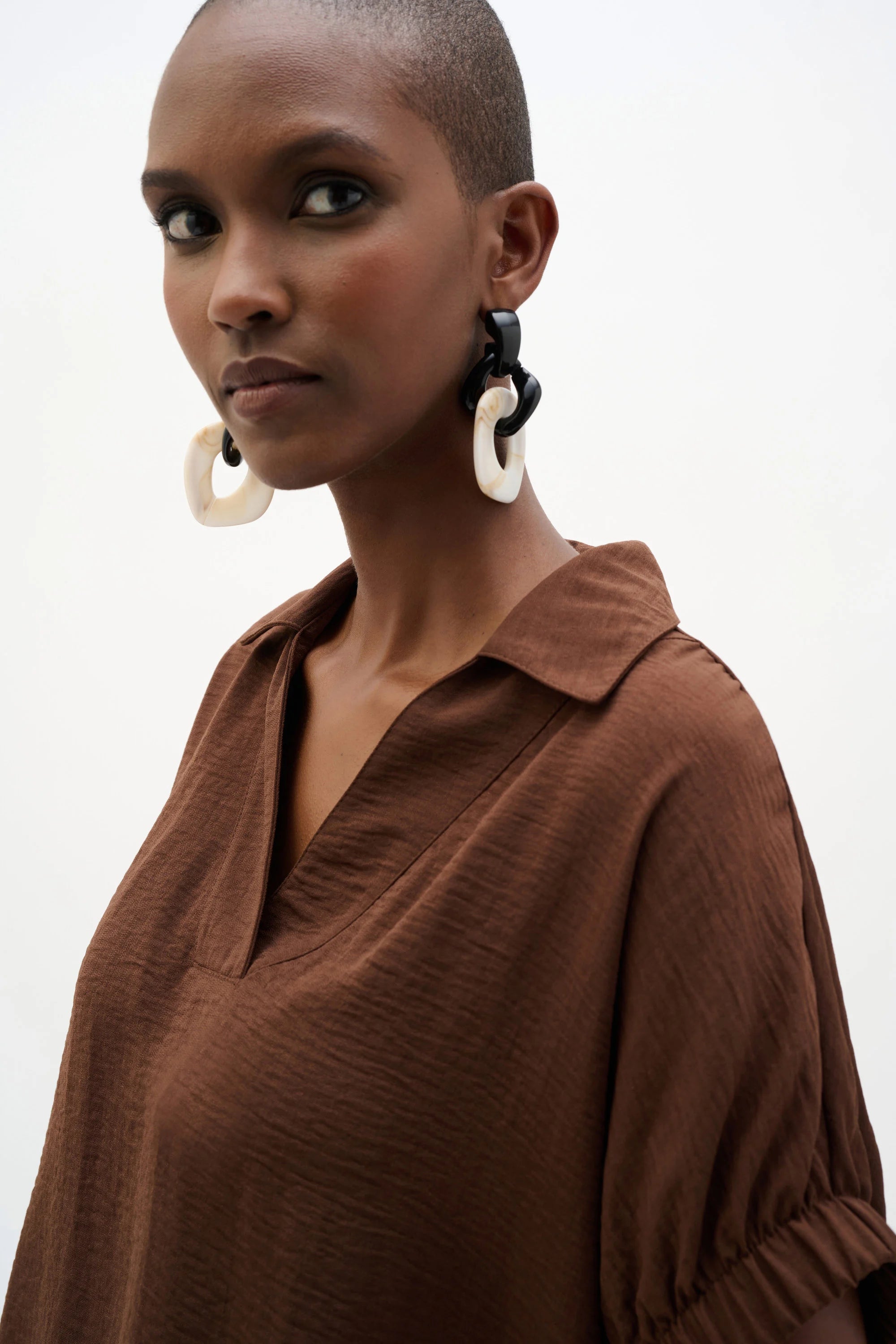Close Up View Image of Joseph Ribkoff Woven Gauze Boxy Top With Shirred Sleeves in Mahogany
