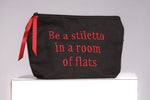 Front image of Cosmetic bags. Be a stiletto in a room of flats bag. 