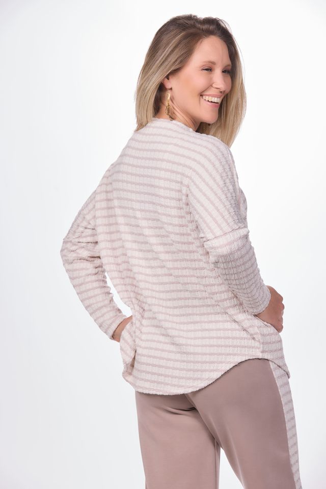Back image of long sleeve zip front striped sweater.