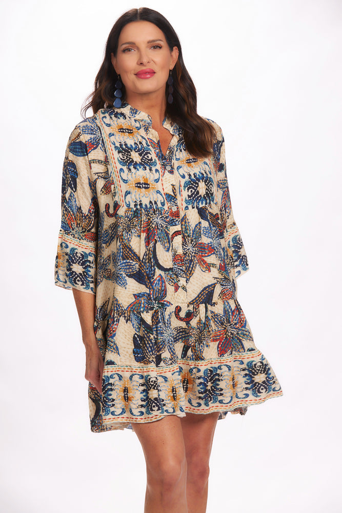 Front image of blue flower button down dress. Flower printed dress made in italy. 