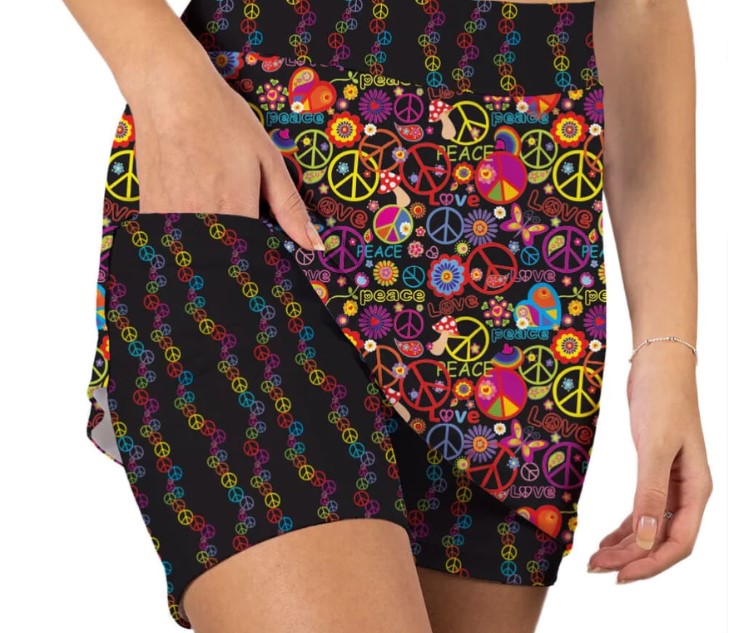 Front image of Skort Obsession peace out print skort. Black and multi printed pull on skort.