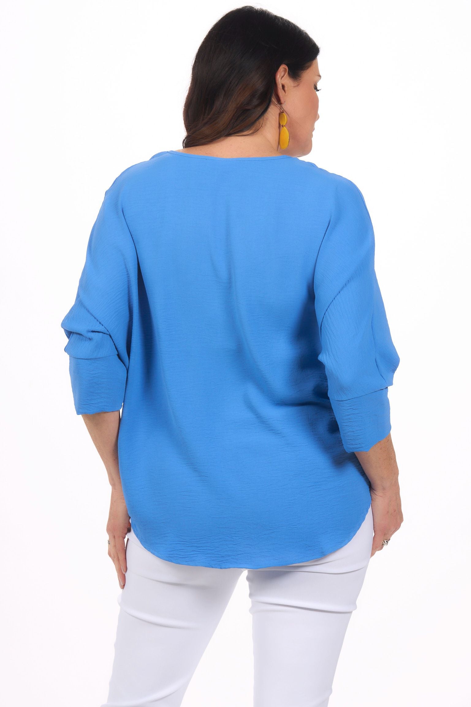 Back image of last tango cobalt blue v neck airflow top.