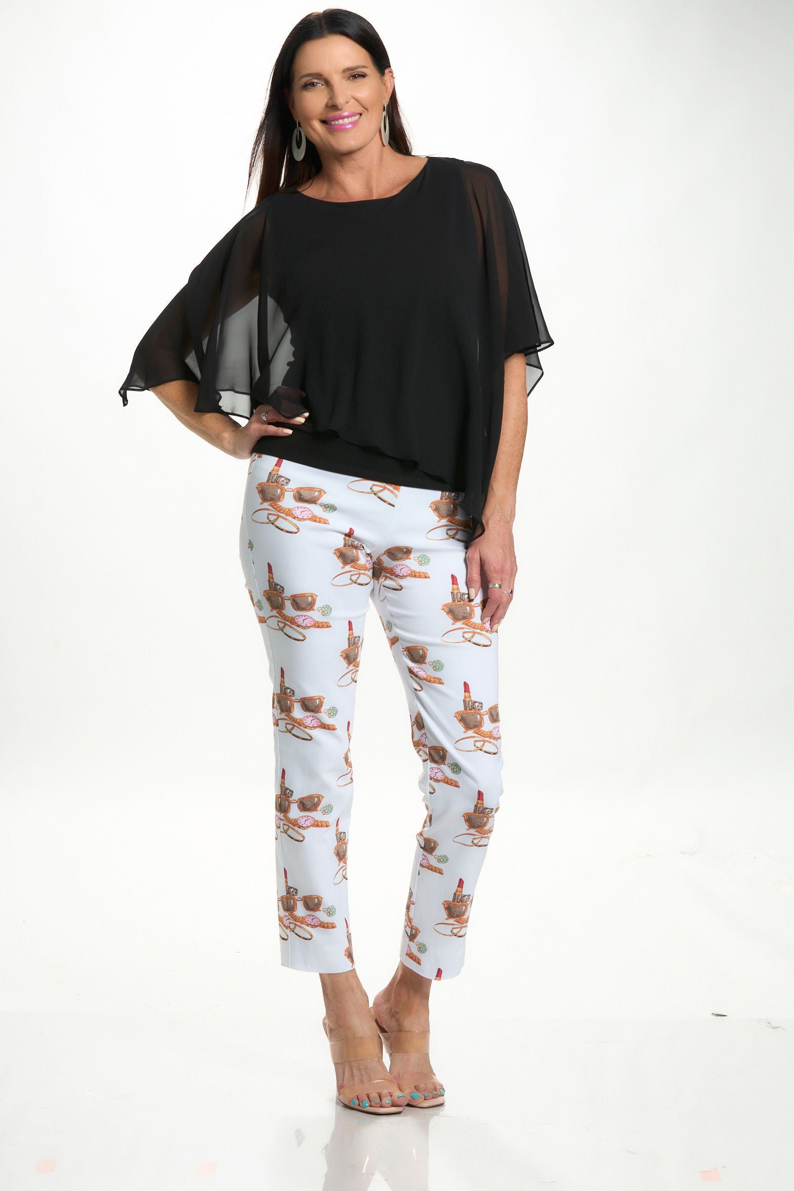 Front image of last tango black chiffon asymmetrical top.