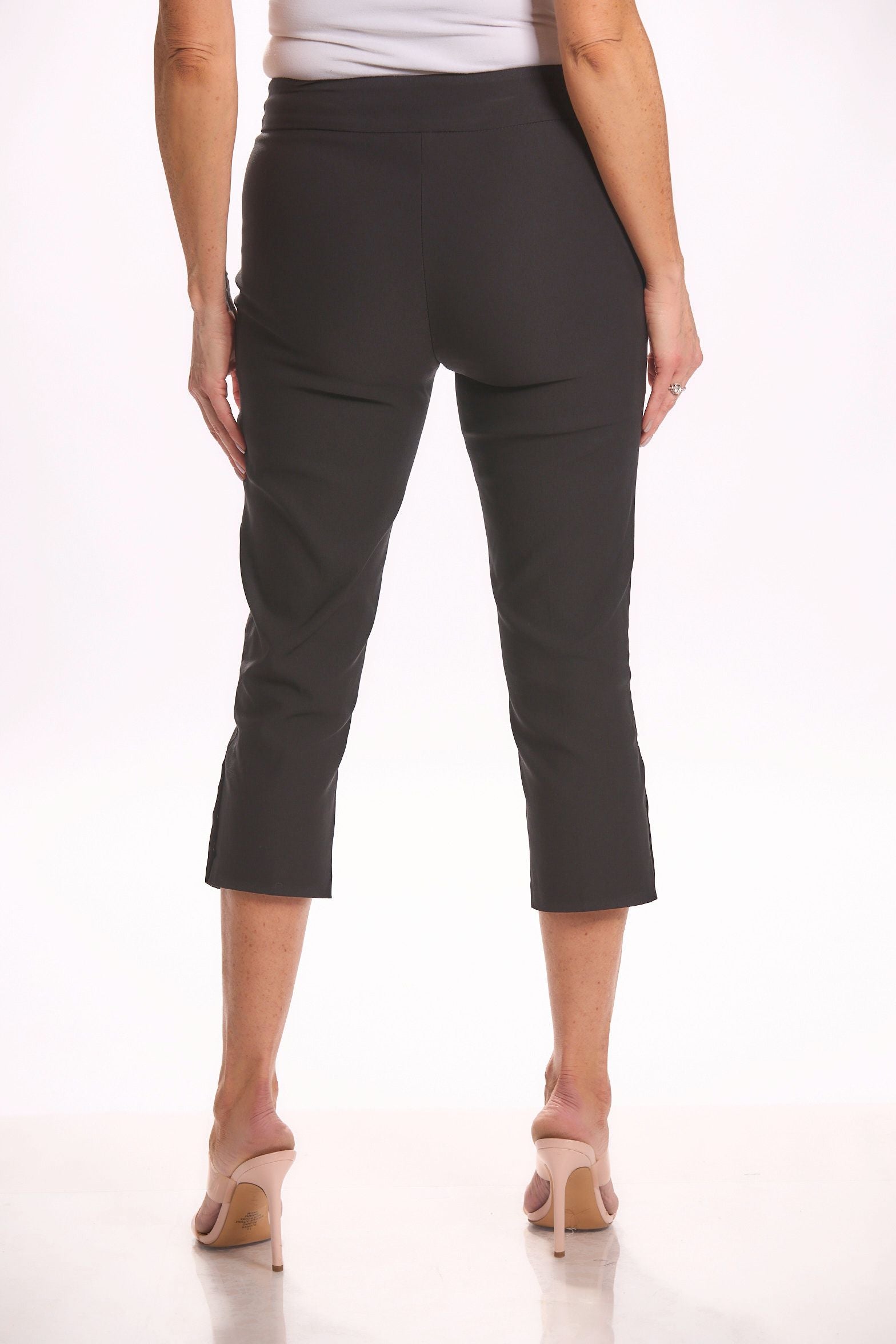 Back image of Tribal pull on black capri bottoms with side snap. Black basic everyday bottoms.