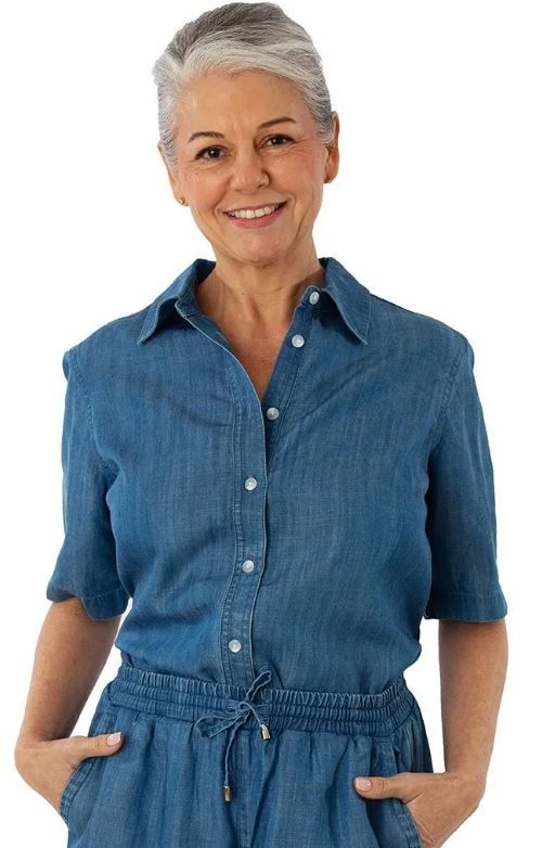 Front image of Coolibar chambray short sleeve shirt. Button front upf 50+ protection top.