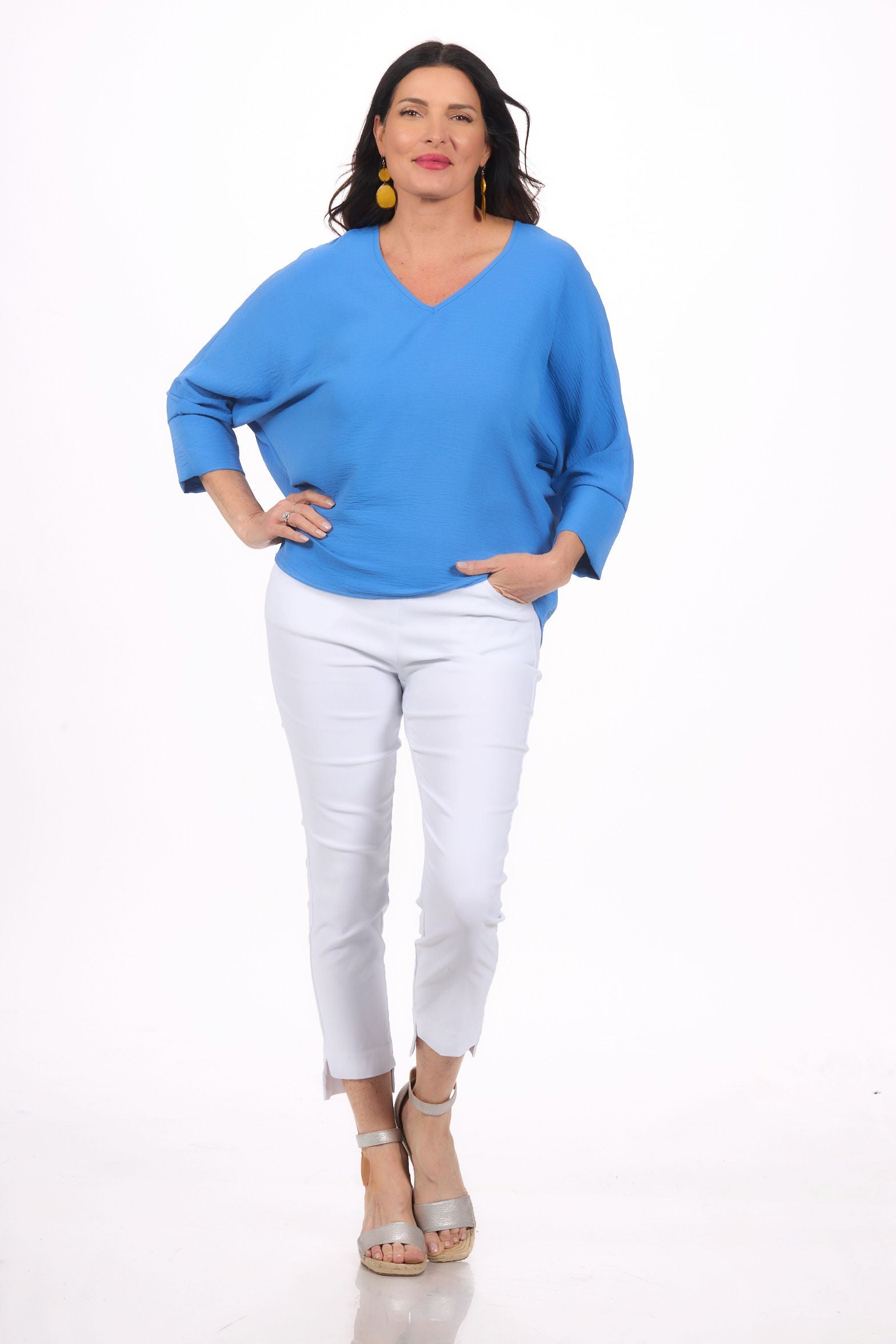 Front image of last tango cobalt blue v neck airflow top.