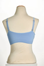 Back image of denim skinny sheer strap its bra. 