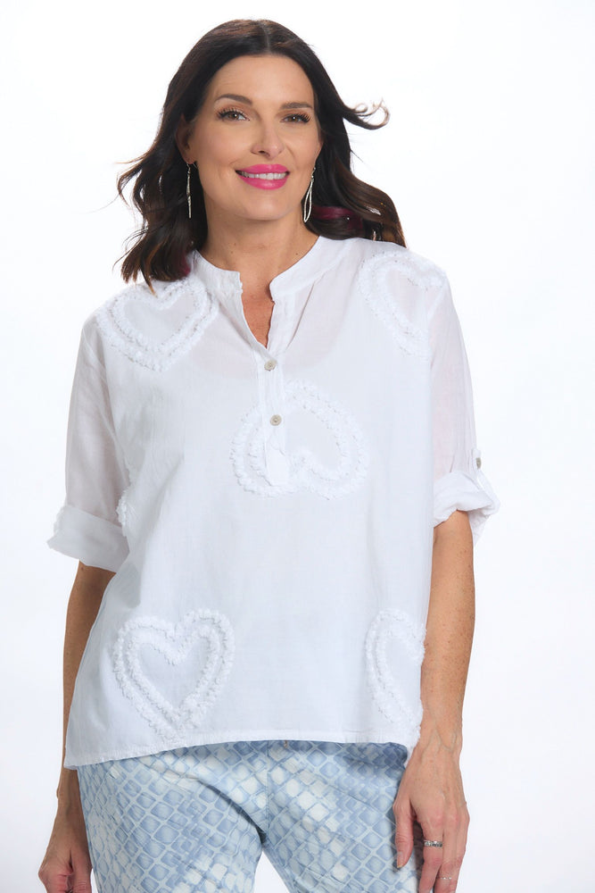 Front image of made in italy white henley embellished heart shirt. Roll sleeve white top. 
