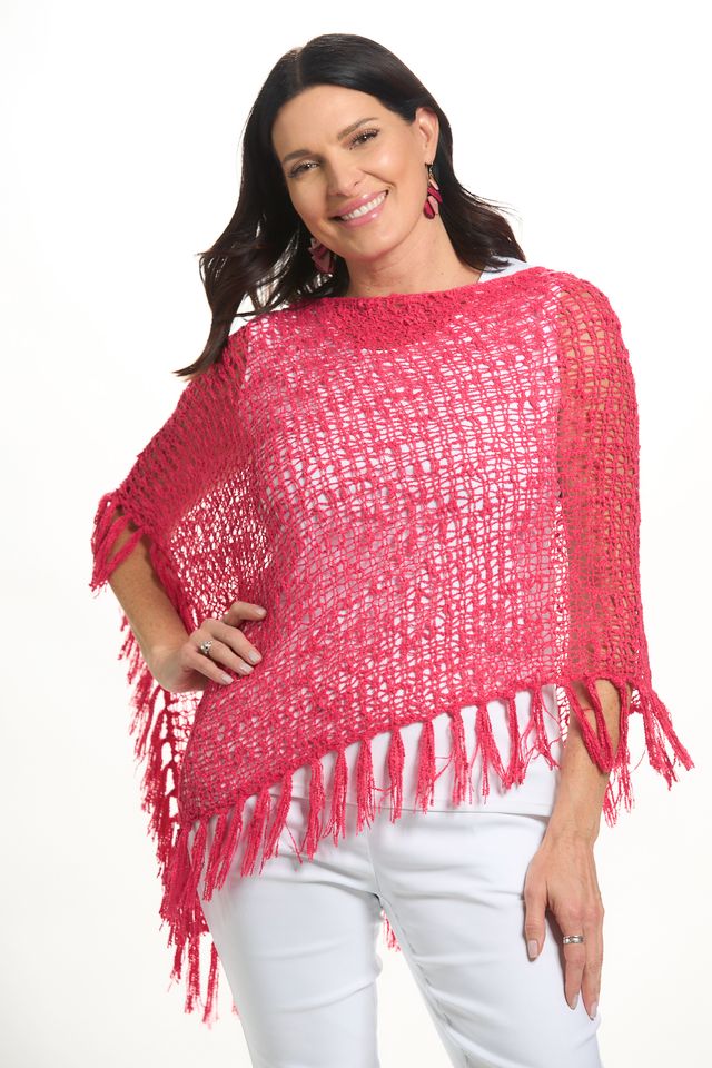 Front image of lost river fringe popcorn poncho in hot pink.