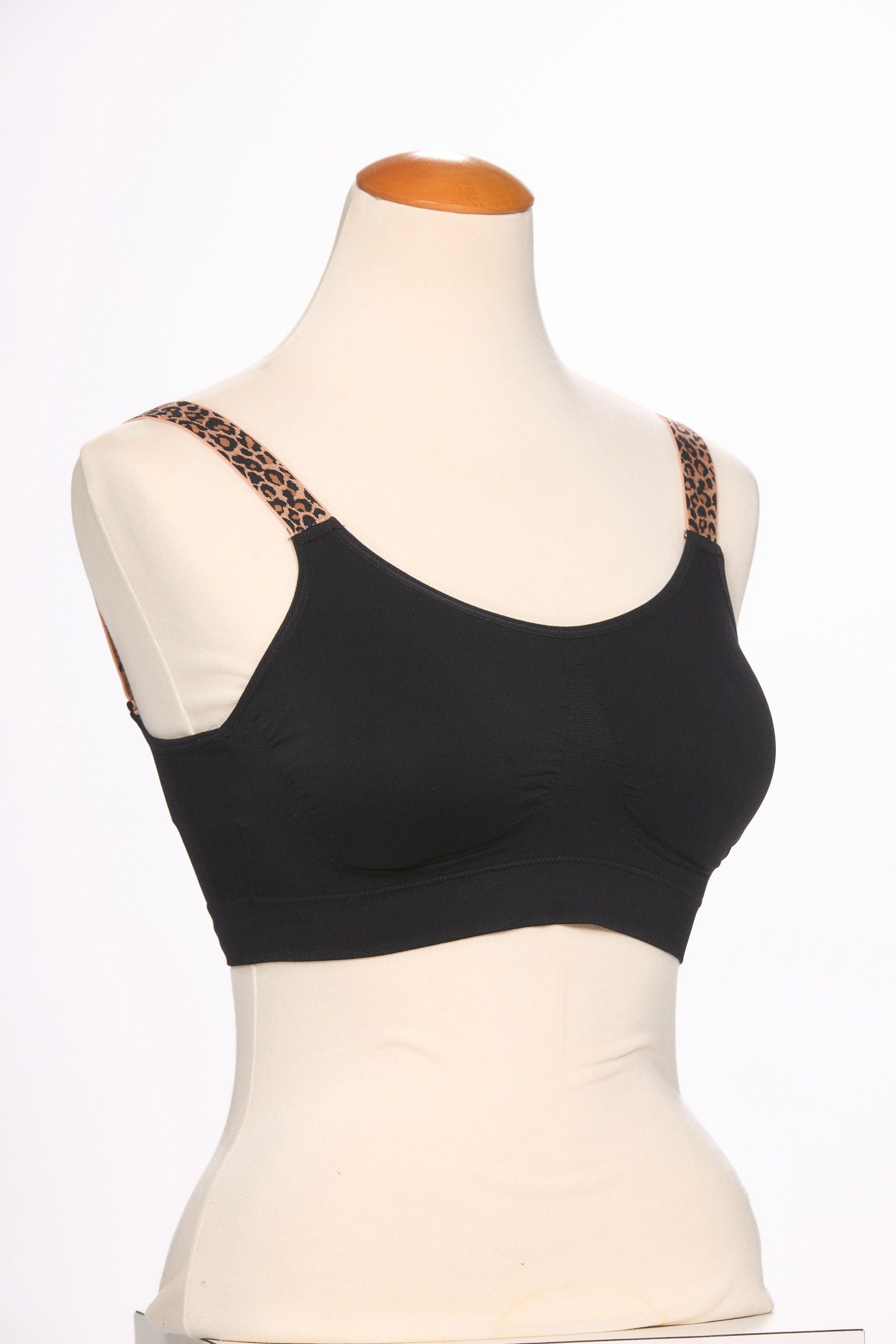 Front image of black leopard printed strap its bra.