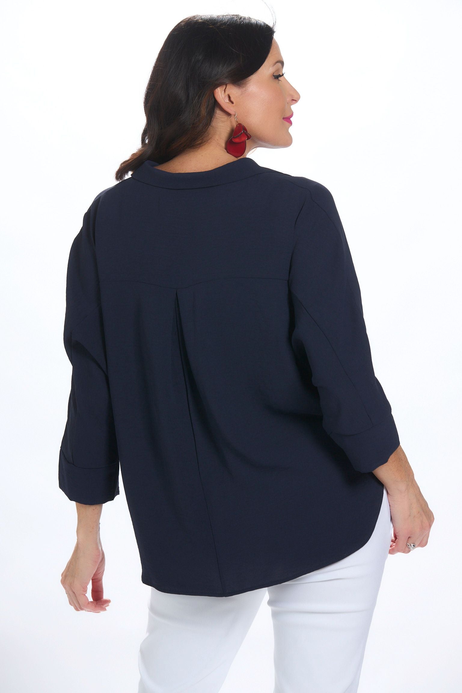 Back image of 2 button air flow shirt. Navy two button top.