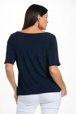 Back image of Mimozza dolman sleeve relaxed top in navy. 
