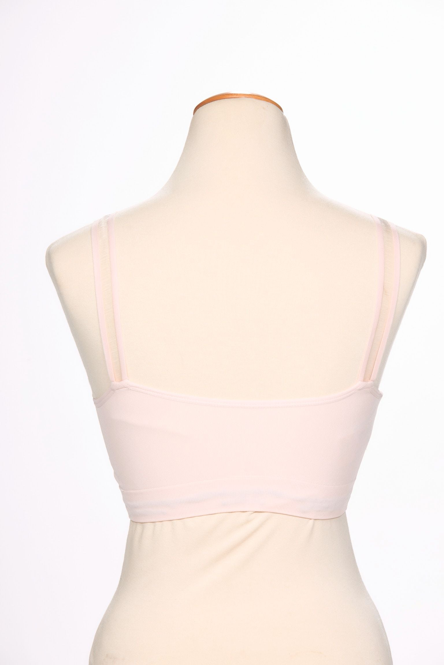 Back image of pale pink sheer strap its bra.