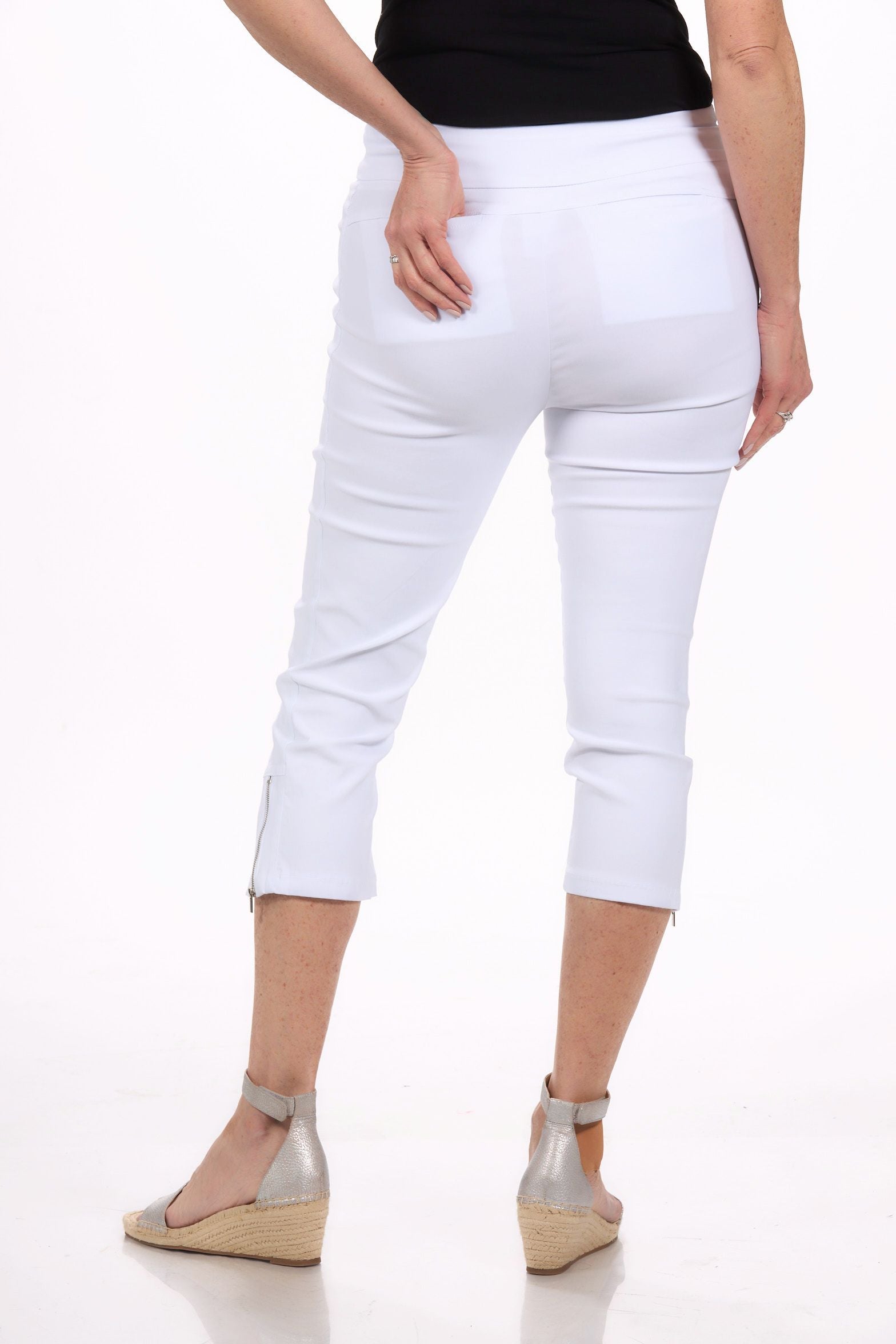 Back image of white pull on capri bottoms.