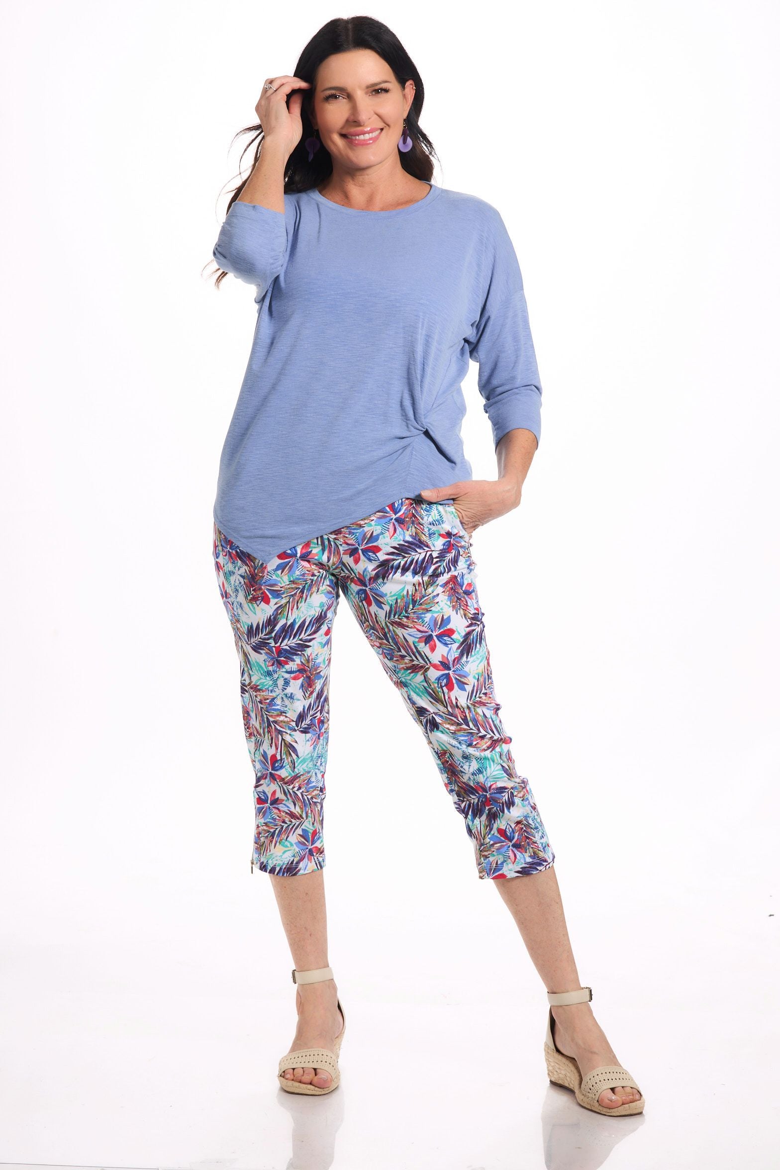 Front image of tribal pull on capri in melon leaf paint.