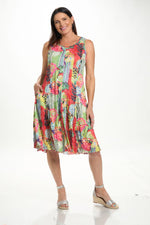 Front image of sleeveless crinkle dress with pockets. 