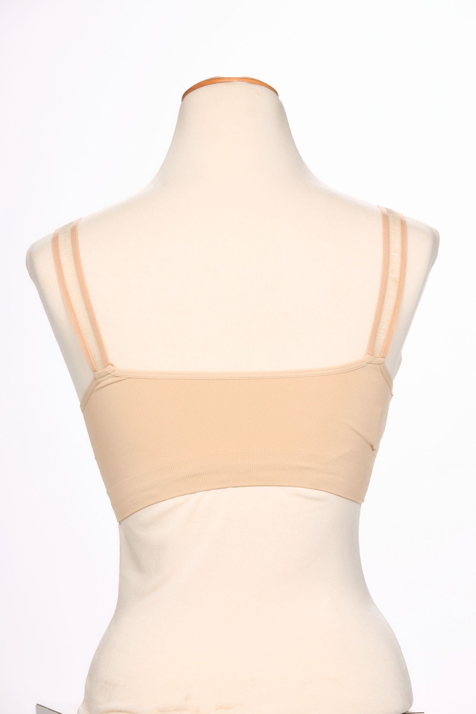 Back image of strap its bra in sheer nude.