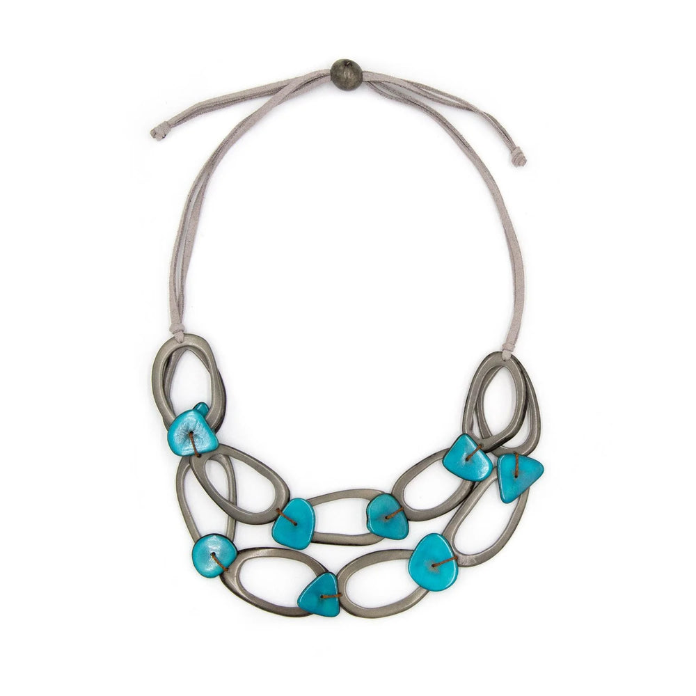 Front image of Tagua Crystal Necklace. Charcoal and turquoise necklace. 