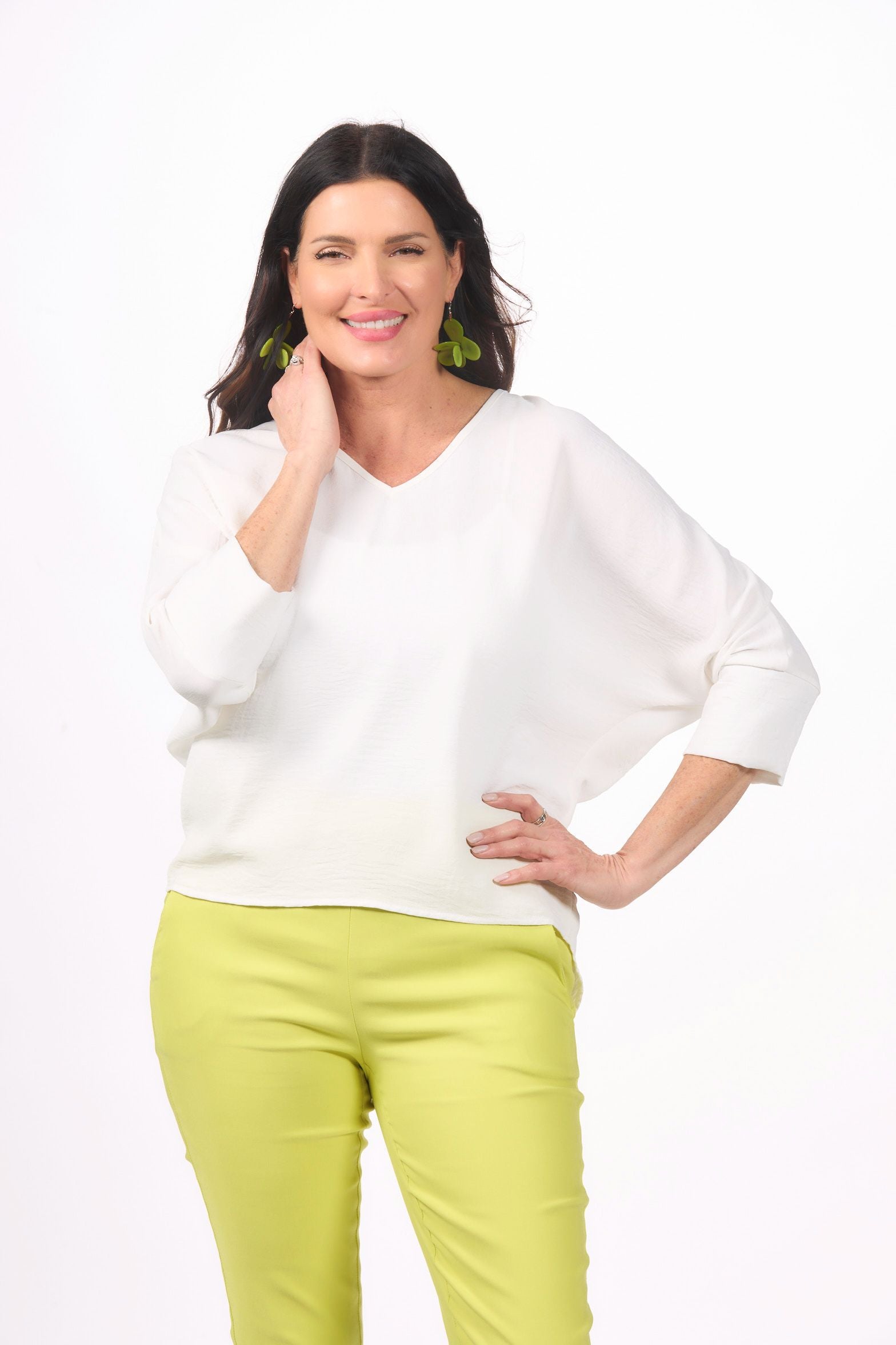 Front image of last tango v-neck dolman sleeve top in white.