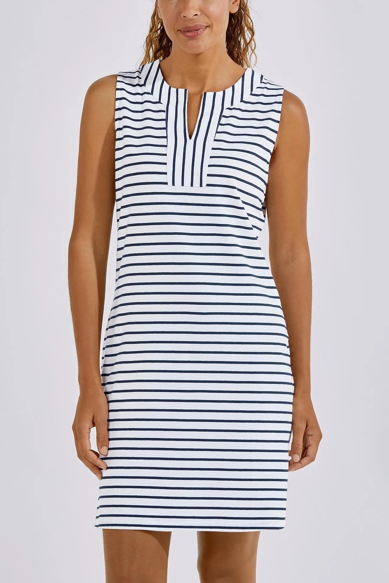 Front view of coolibar oceanside tank dress. Striped sleeveless. Oceanside tank dress.