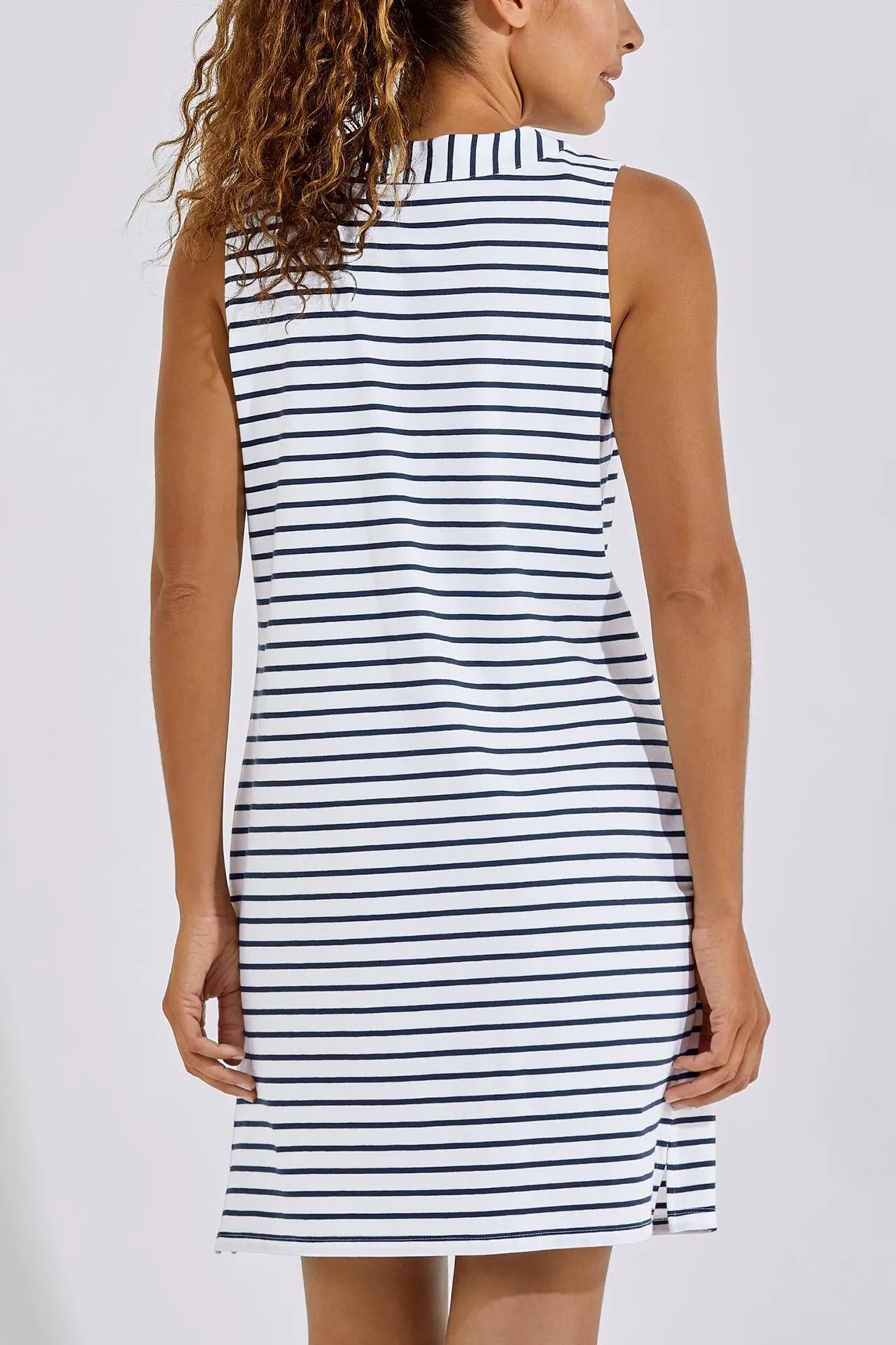 Back view of coolibar oceanside tank dress. Striped sleeveless. Oceanside tank dress.