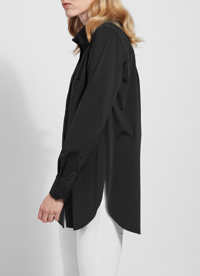 Side view of Lysse Shiffer button down top. Long sleeve button front black top.