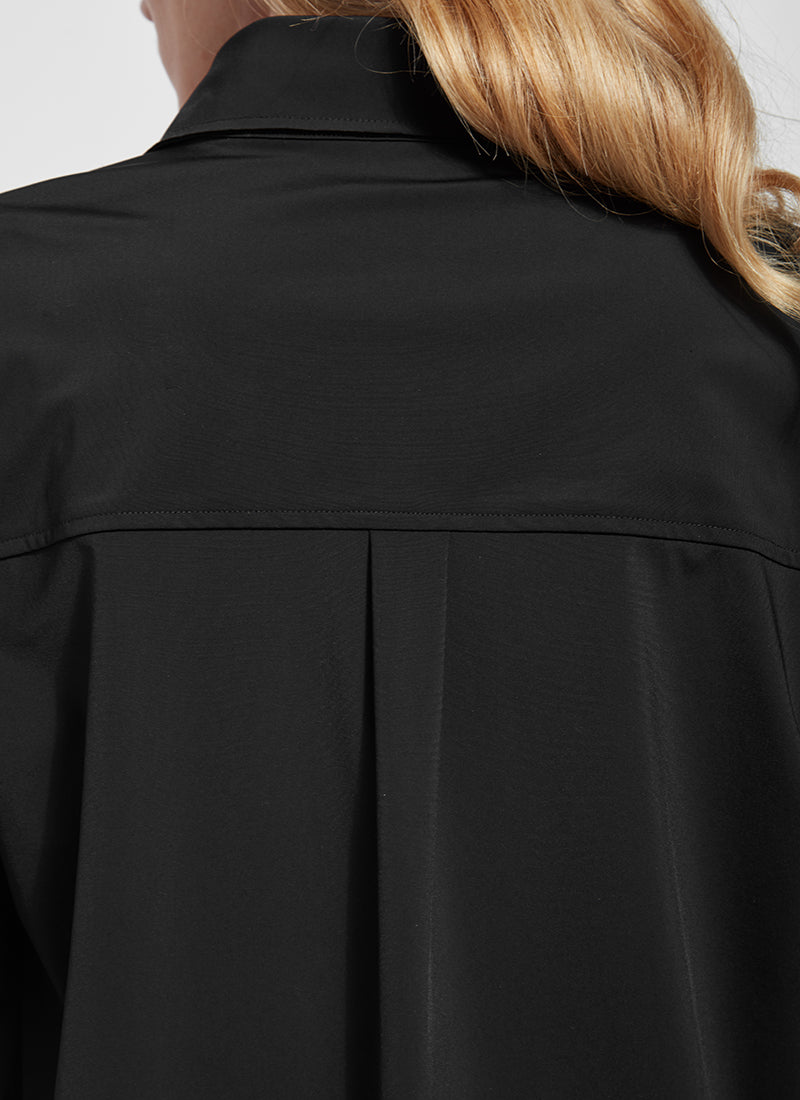 Back view of Lysse Shiffer button down top. Long sleeve button front black top.