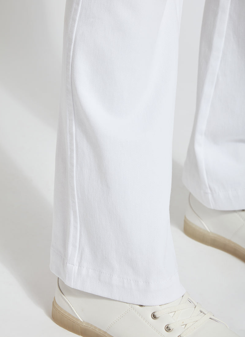 Zoomed bottom view of Lysse baby bootcut denim pants in white. Pull on lysse pants.