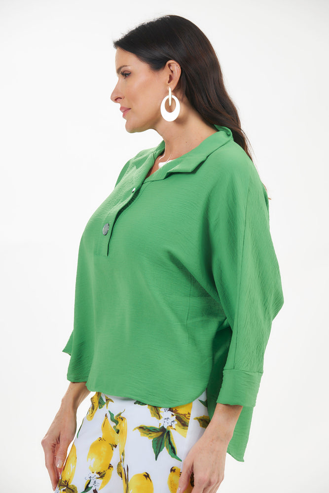 Side image of Last Tango gucci green 3/4 sleeve top. 2 button air flow shirt. 