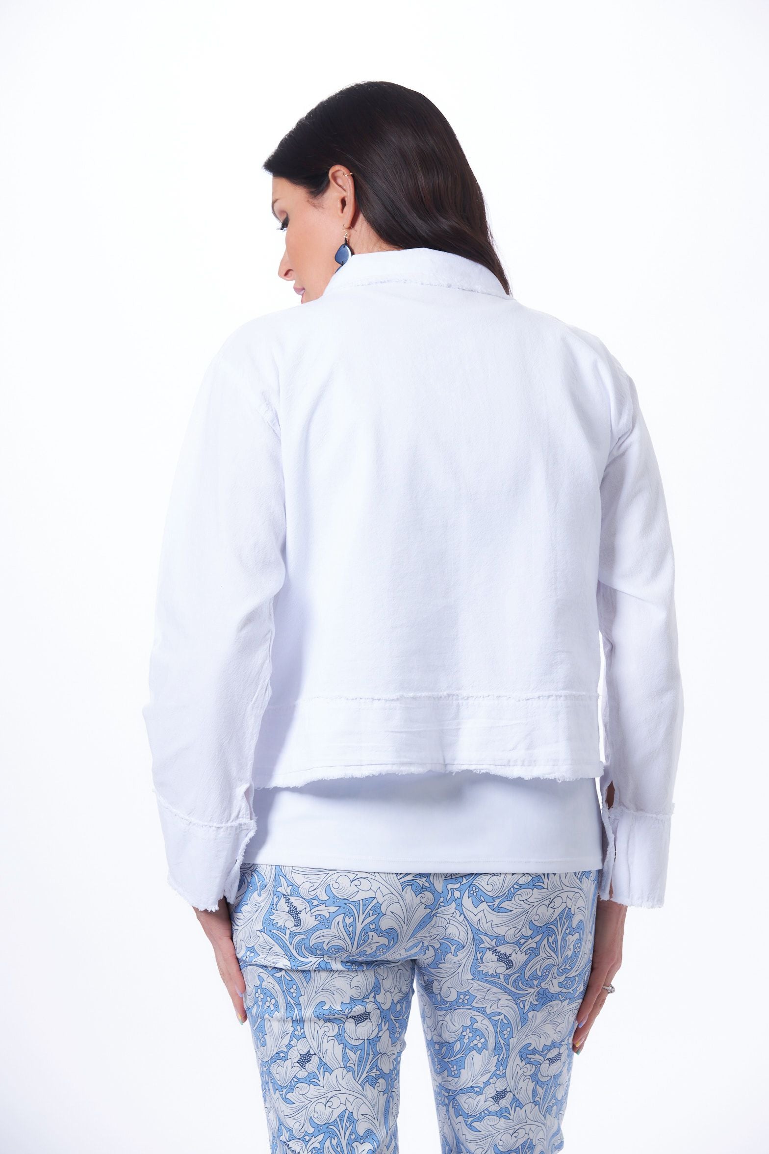 Back image of Giocam long sleeve jacket. White button front jacket.
