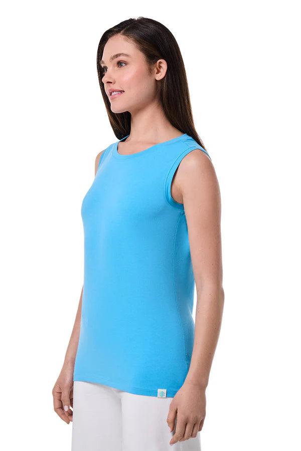 Woman wearing a blue sleeveless top on a white background