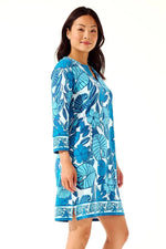 Front image of Coolibar oceanside tunic dress. Casia palm printed dress. 