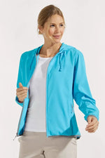Front image of Coolibar arcadian packable sunblock jacket. Aruba blue solid hooded jacket. 