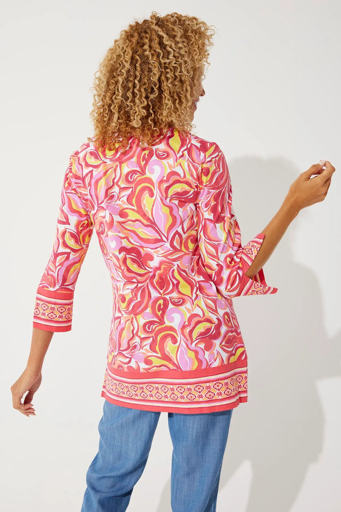 Back image of Coolibar St. Lucia Tunic Top. Coral Multicolor rio paisley printed tunic. 