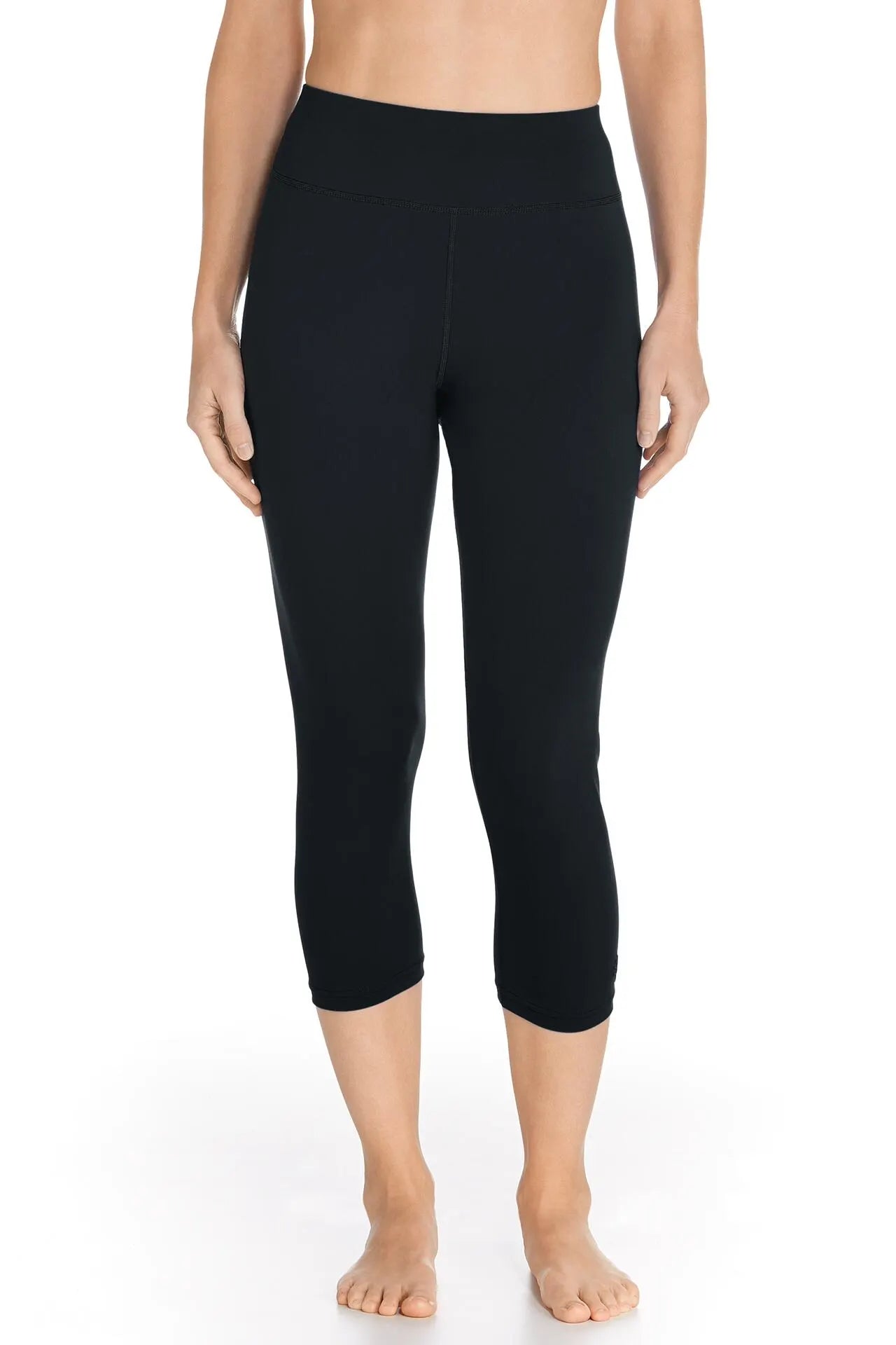 Front image of Coolibar deep water swim capri. Black solid capri. 