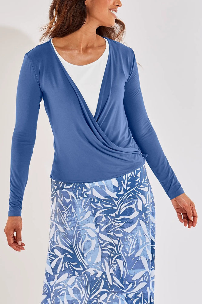 Front image of Coolibar vrae everyday fashion wrap. Blue long sleeve cardigan. 