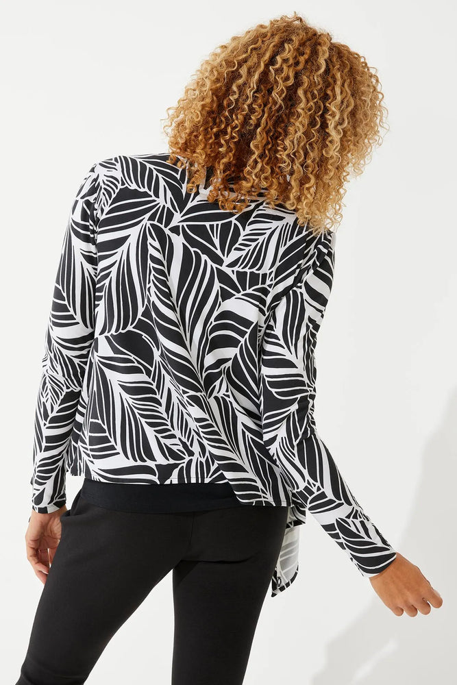 Back image of Coolibar black and white coconut palm vrae everyday fashion wrap. Long sleeve printed top. 