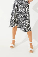 Front image of Coolibar Marigot Midi Skirt. Black and white printed skirt. 