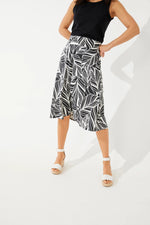 Front image of Coolibar Marigot Midi Skirt. Black and white printed skirt. 